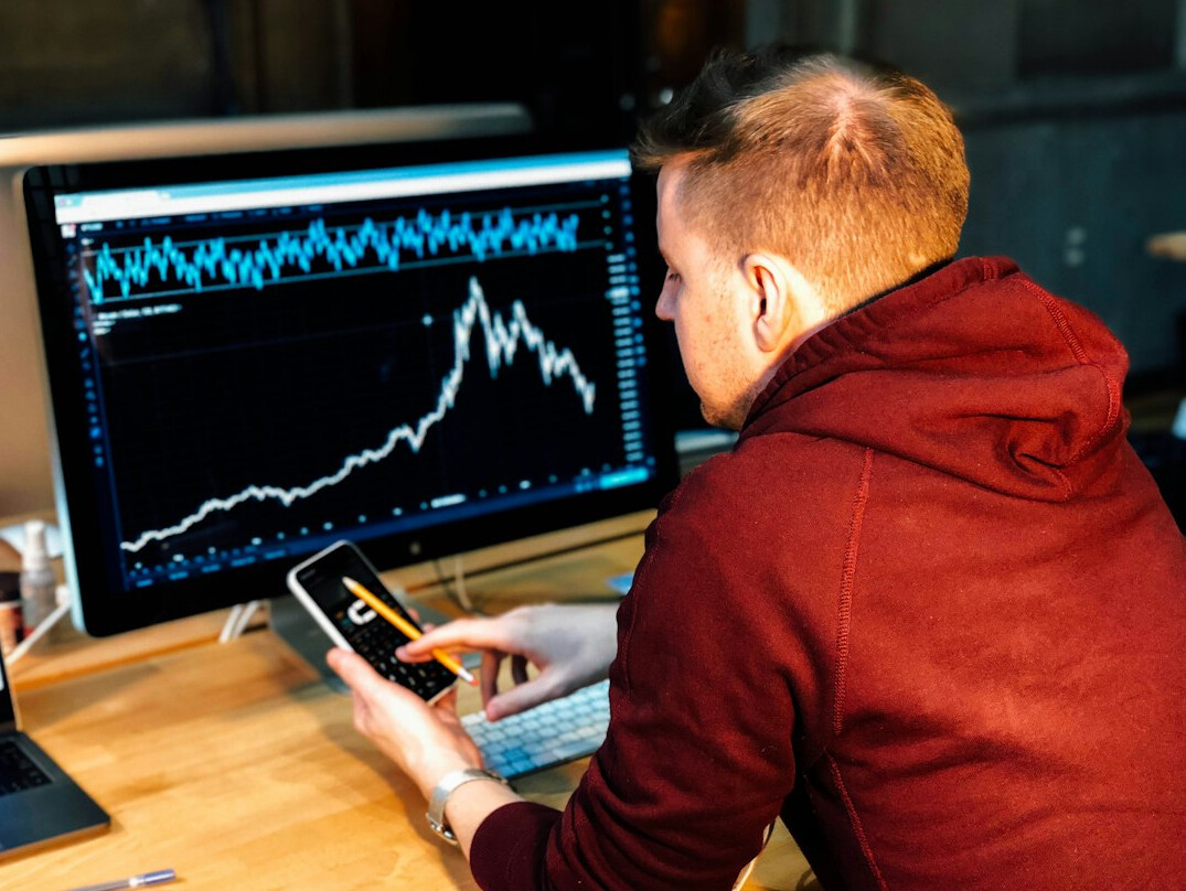 man reviewing productivity chart