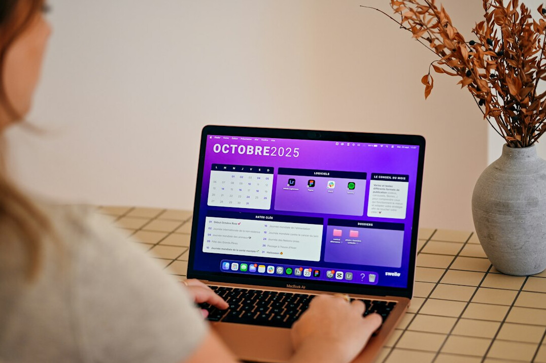 woman checking calendar on laptop