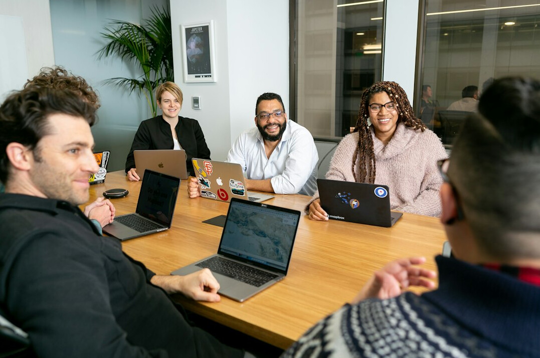 modern business leader team meeting